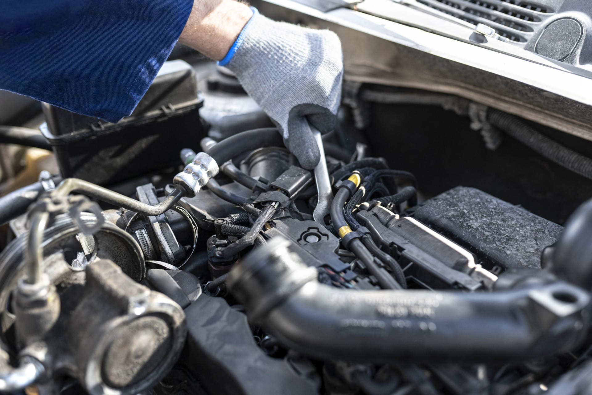 male-mechanic-working-his-workshop